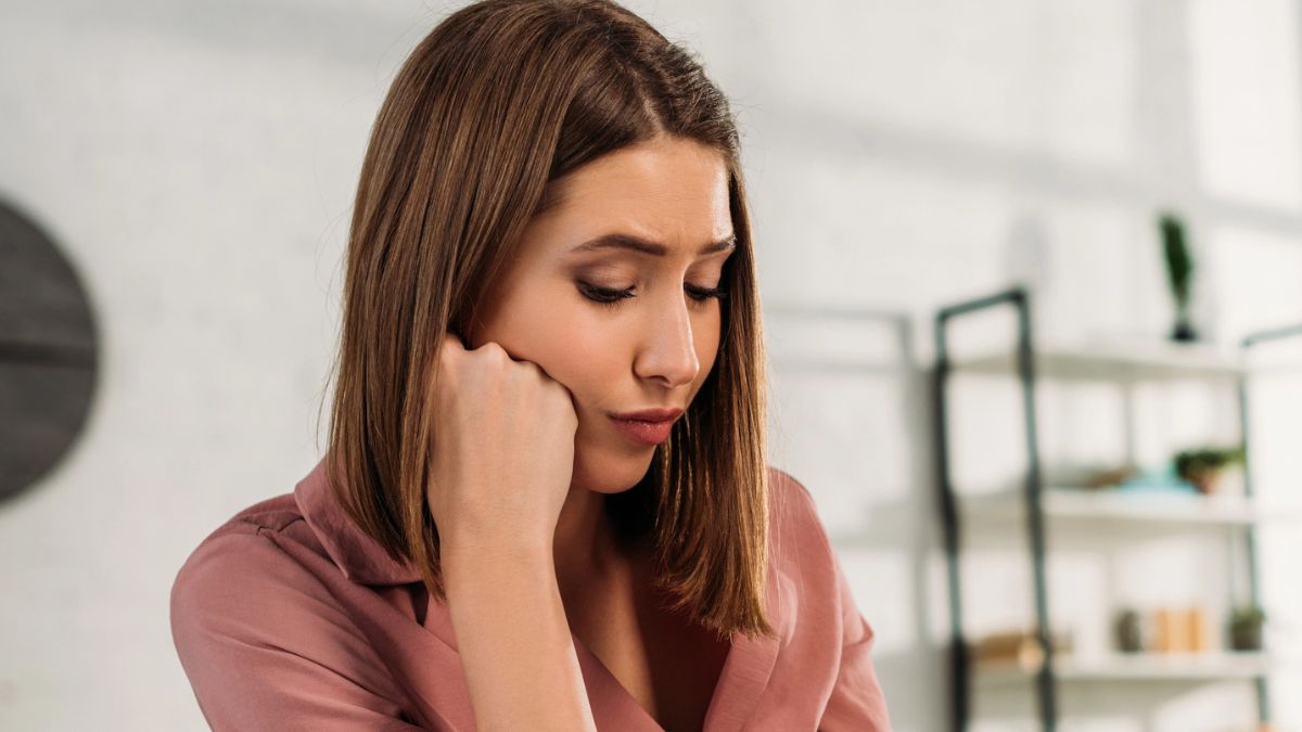 woman resting on hand tired