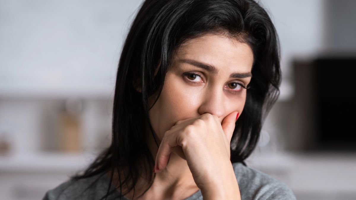 woman sad regret