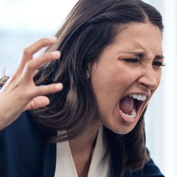 woman screaming at her computer