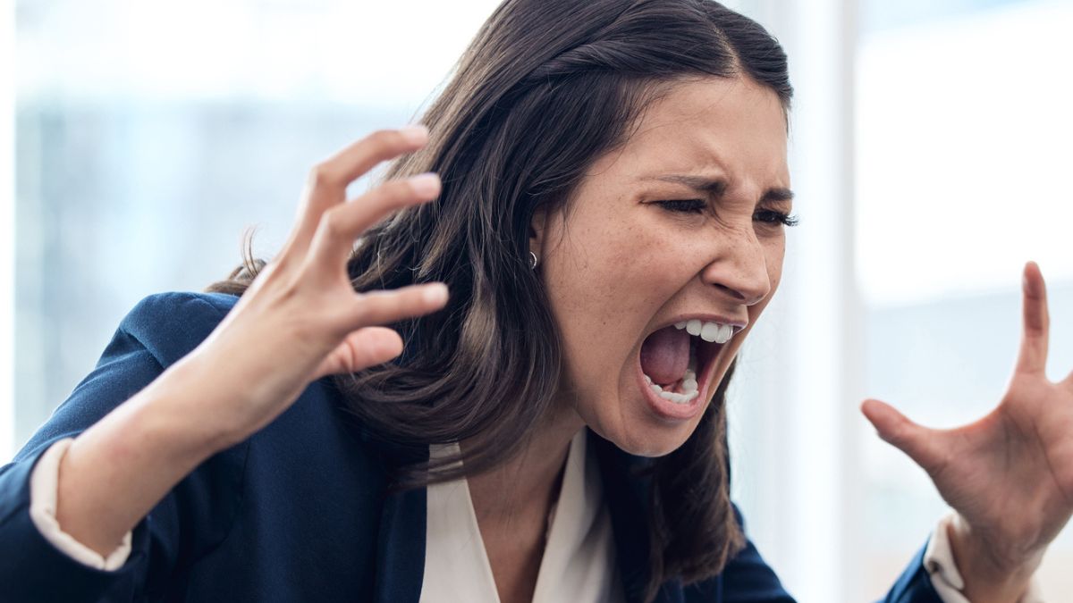 woman screaming at her computer