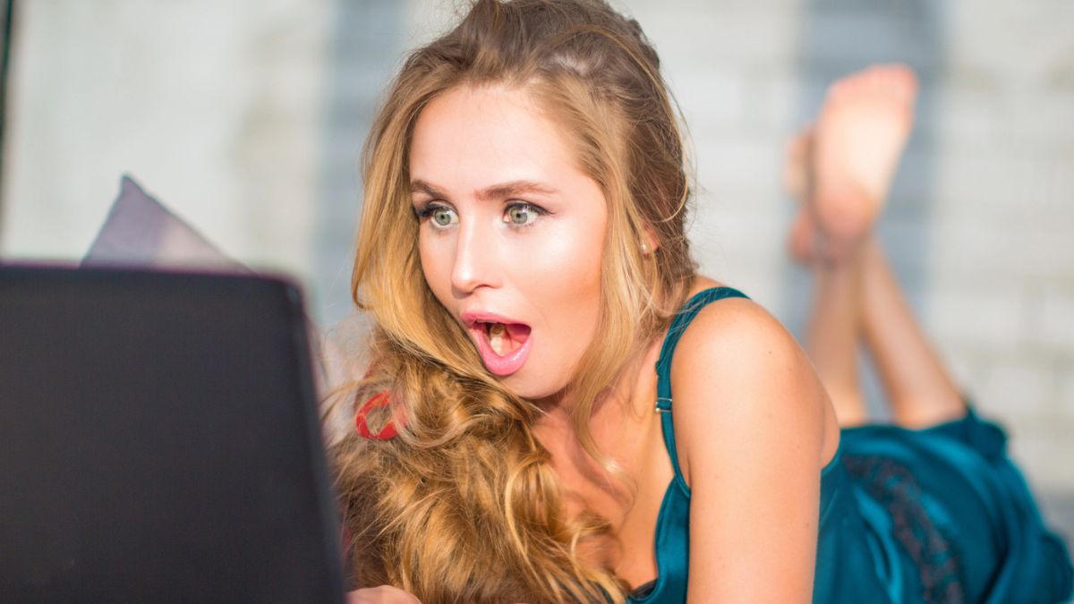 woman shocked her lapto