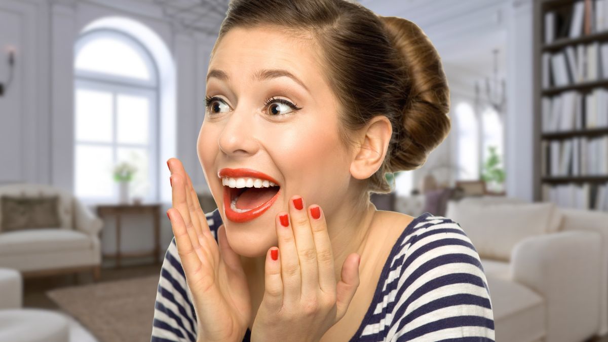woman shocked in her living room