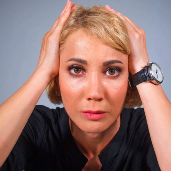 woman stressed at a desk